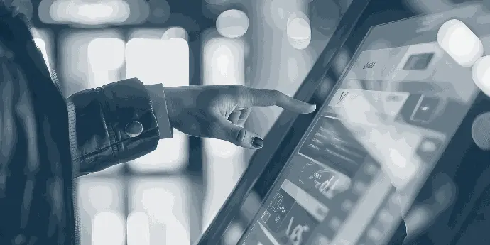 Individual using an kiosk touchscreen, highlighting the convenience of digital POS solutions.